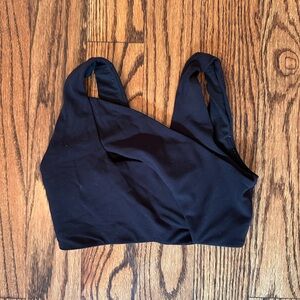 Lululemon sports bra in black with criss cross straps on front